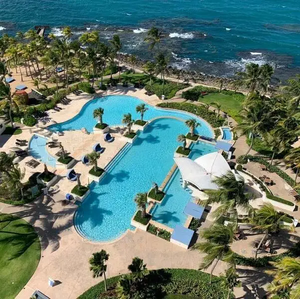 Caribe Hilton beach cove with clear water
