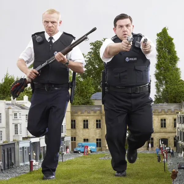 Hot Fuzz police officers running with guns