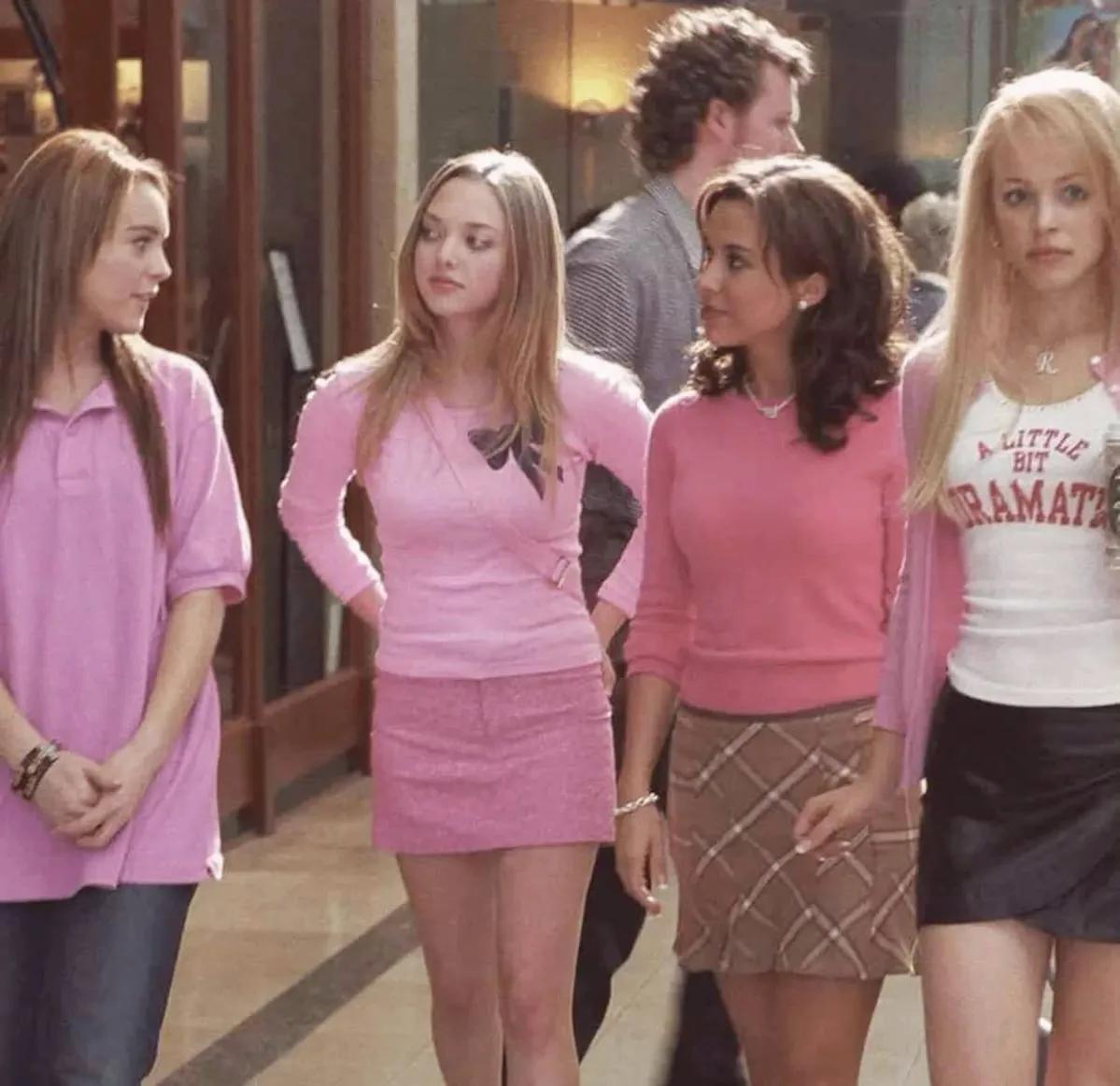 Mean Girls movie cast in school hallway